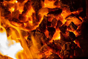 Close up photo on red coals in bonfire