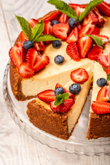 Delicious cheesecake with fresh strawberries for dessert. healthy organic summer berry dessert cheesecake. Homemade cheese cake