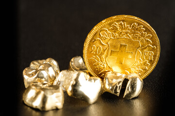 Vreneli Goldmünze Schweiz 20 FR - Schweizer Goldvreneli (Zahl) und daneben Zahngold (Goldzähne)