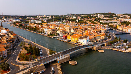 Aerial view of the administrative center with residential areas of the seaside town of Martigues,...