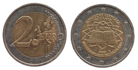 Germany - circa 2007 : a 2 Euro coin of Germany with a map of Europe and a book symbolizing the Treaties of Rome, EEC Treaty