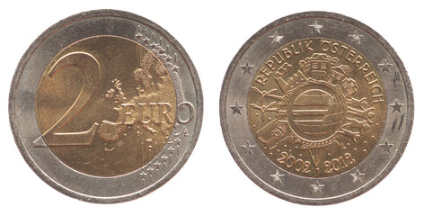 Austria - circa 2012: a 2 Euro coin of Austria with a map of Europe and Euro symbol on globe with...