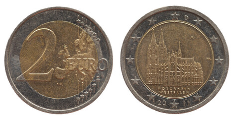 Germany - circa 2011 : a 2 Euro coin of Germany with a map of Europe and the historic building of...