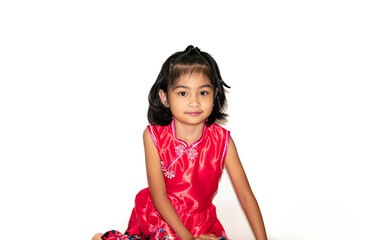 portrait of a little girl playing on the floor