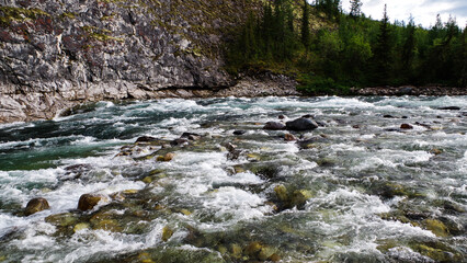 mountain river. thresholds. stone shores