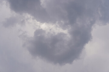 Fototapeta na wymiar Rain clouds like black smoke, time lapse of clouds