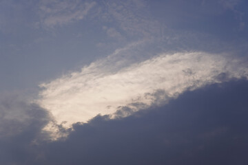 Obraz premium sky after rain, white clouds and black clouds in the sky