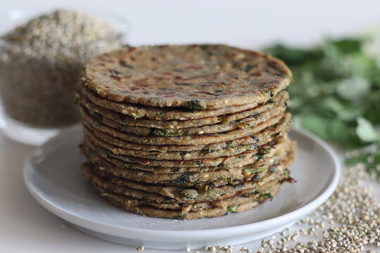 Bajra methi thepla. Indian flat bread made of pearl millet flour, fenugreek leaves, sesame seeds, yogurt and spices