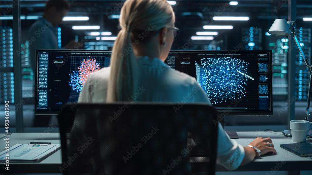Poster Portrait of Female Technical Operator Works with Display Showing Neural Network In the System Control Dark Room. Caucasian IT Technician Works on Artificial Intelligence. Big Data Scientific Research.