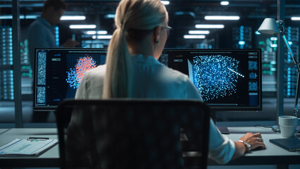 Portrait of Female Technical Operator Works with Display Showing Neural Network In the System...