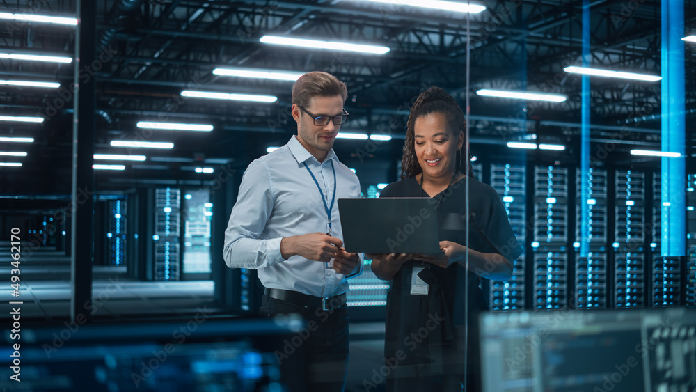 Poster Information Technology Engineer and System Administrator Monitoring Web Services Cloud Solution Software and Sharing Ideas with Each Other in Big Data Center Server. People Use Laptop.
