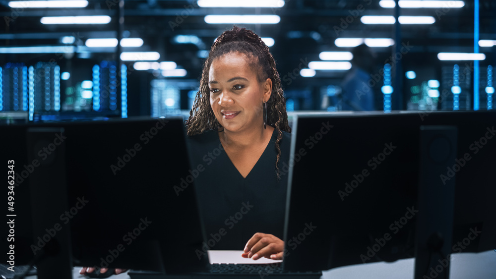 Aufkleber portrait of african american female it specialist working on desktop in data center. system administ