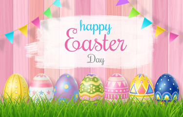 Happy Easter Day colorful egg on grass and beautiful wood background with copy space