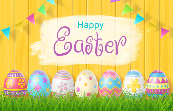 Happy Easter Day colorful egg on grass and beautiful wood background with copy space