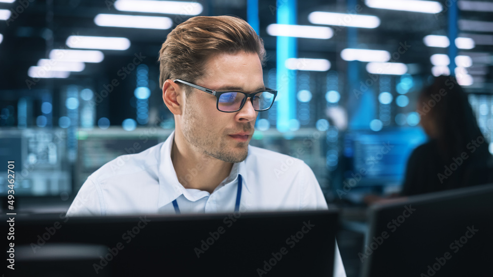 Poster Technical Operator Sits and Monitors Various Activities on Two Computer Displays In the System Control Room. Responsibility for Information Security in the Company Concept