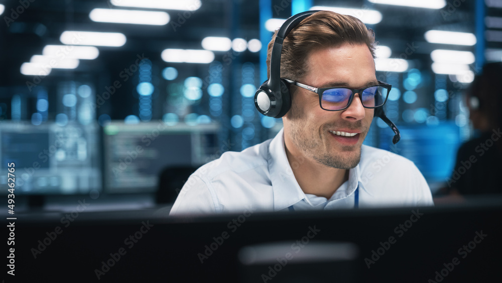 Aufkleber High-Tech Startup Concept: Innovative Male Software Engineer Standing, Doing Big Data Analysis near the Monitors Showing Programming Code. Developing Futuristic e-Commerce App with Machine Learning.