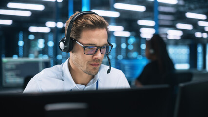 Machine Learning Engineer or System Administration Programming at His Workstation. Man Plans and...