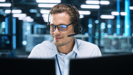 Concentrated Male Customer Support Agent Receptionist wear Headset Consult Online Client Looking at Computer Screen, Helpline Operator Secretary Make Conference Video Call - obrazy, fototapety, plakaty