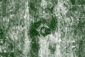 Distressed dark green grunge textured old concrete wall surface for background