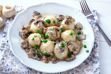 Dumplings with mushroom sauce