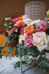 beautiful modern flower arrangement on a table of light flowers. floral decor