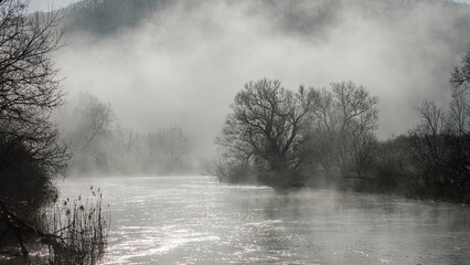 the river landscape of the werra valley at herleshausen in the early morning