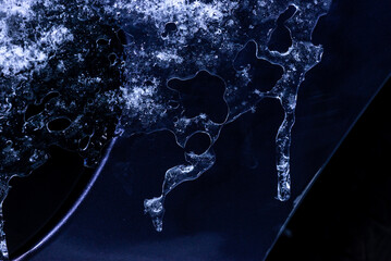 Ice and snow on a black background