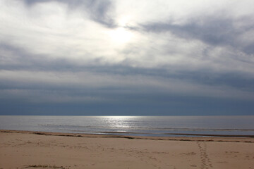 Fototapeta na wymiar sandy beach and clouds