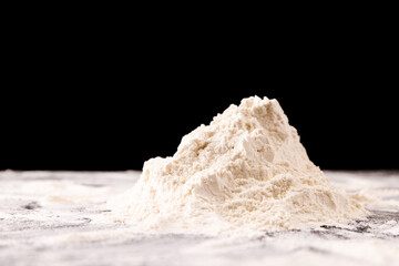 flour pile with black background