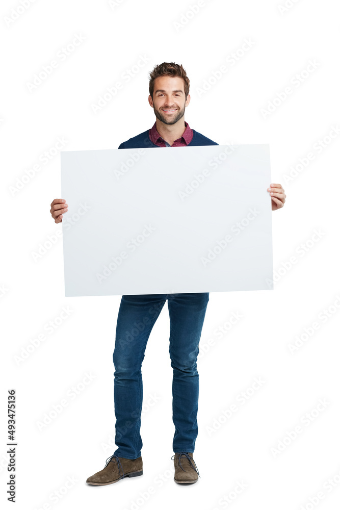 Poster copyspace for your customization. studio portrait of a handsome man holding a blank placard against 