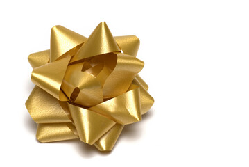 Closeup stitch gift ribbon golden white background