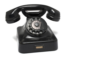 Closeup bakelite landline phone dial white background