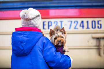 Ukrainian refugees on Lviv railway station waiting for train to escape to Europe