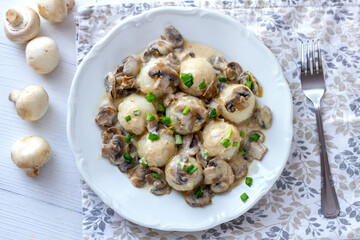 Dumplings with mushroom sauce