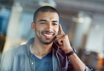 Youve got some good ideas. Cropped shot of a young businessman talking on his mobile phone.