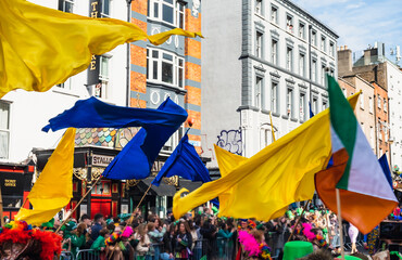 Fototapeta premium Ukraine flags in the parade, Saint Patrick's day celebration in Dublin 2022, Ireland