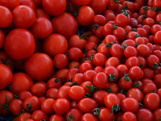 Ripe red tomatoes on a farmers market stall in the Aegean coastal town Yalikavak, Bodrum, Turkey.
