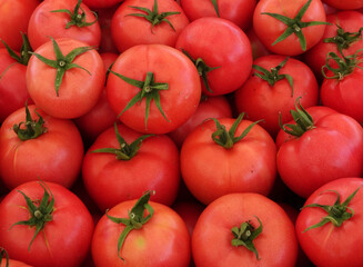 Pink tomatoes on a farmers market stall in Yalikavak, Bodrum, Turkey.             