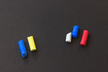 Group pastel crayons separately from each other