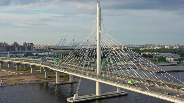 Aerial view of cable-stayed bridge and new stadium in St.Petersburg during sunset, 4k