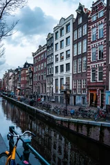 Fototapeten Canales de Amsterdam photo de stock vertical.  © Hugo