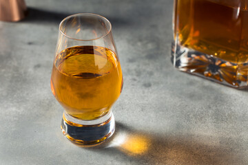 Boozy Whiskey in a Snifter Glass