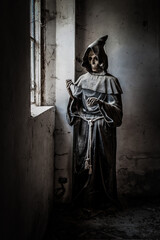 November 2021, Urbex Italy, disturbing statue depicting death, in an abandoned house