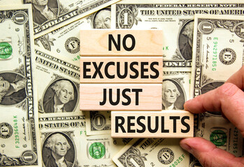 No excuses just results symbol. Concept words No excuses just results on blocks. Businessman hand....