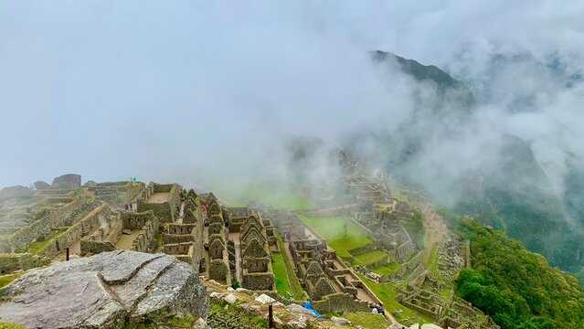 morning in the mountains  from machu picchu with fog in the background 
