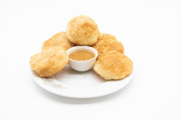 deep fried puri or Poori or luchi with sauce in a plate isolate on white background
