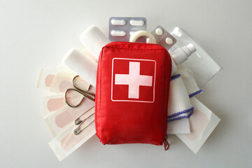 Travel portable first aid bag full of objects and tools top
