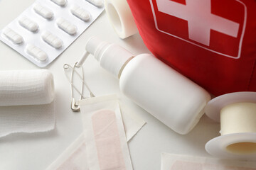 Travel portable first aid bag full of objects and tools top