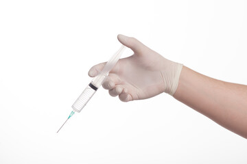 Syringe in man hand in gloves on a white background