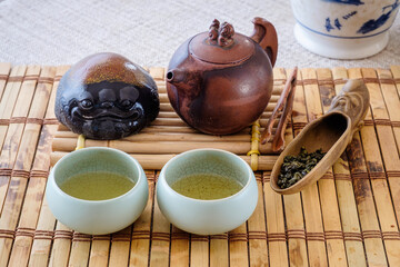 Tea set, on a wooden table of bamboo
